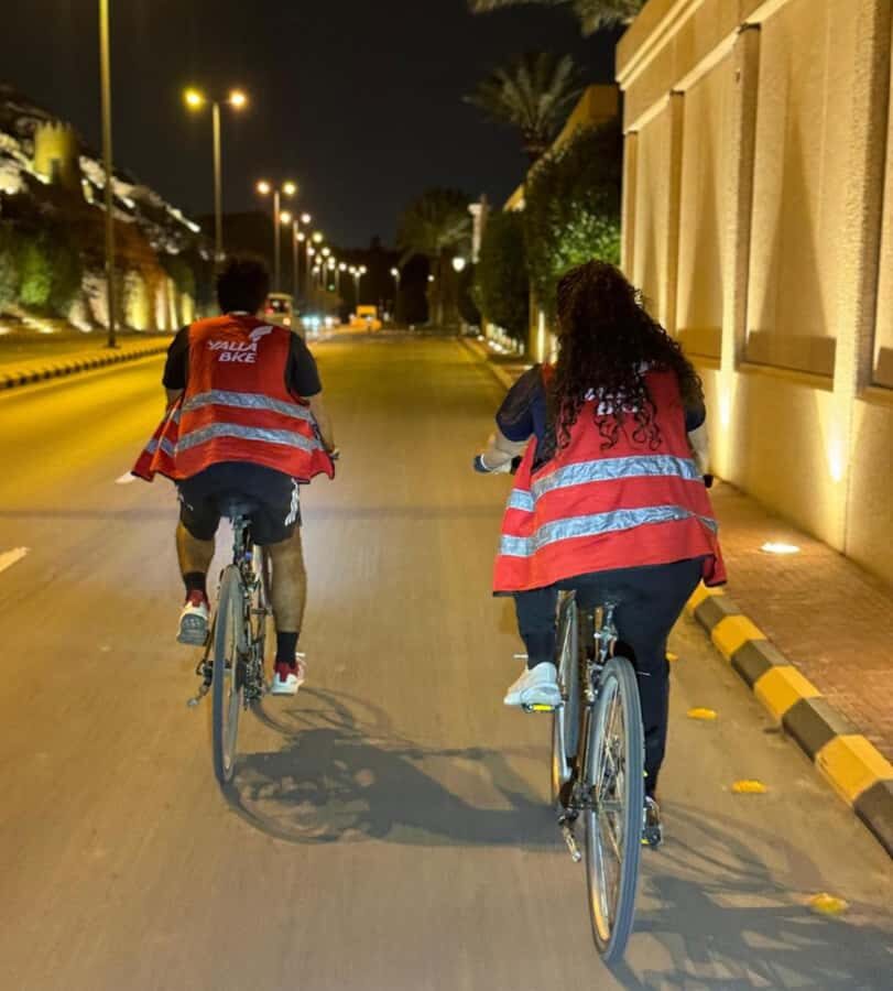 Evening Bike Tour in Wadi Hanifah - The trail portion: flat riding, trees, and mountain views after sunset
