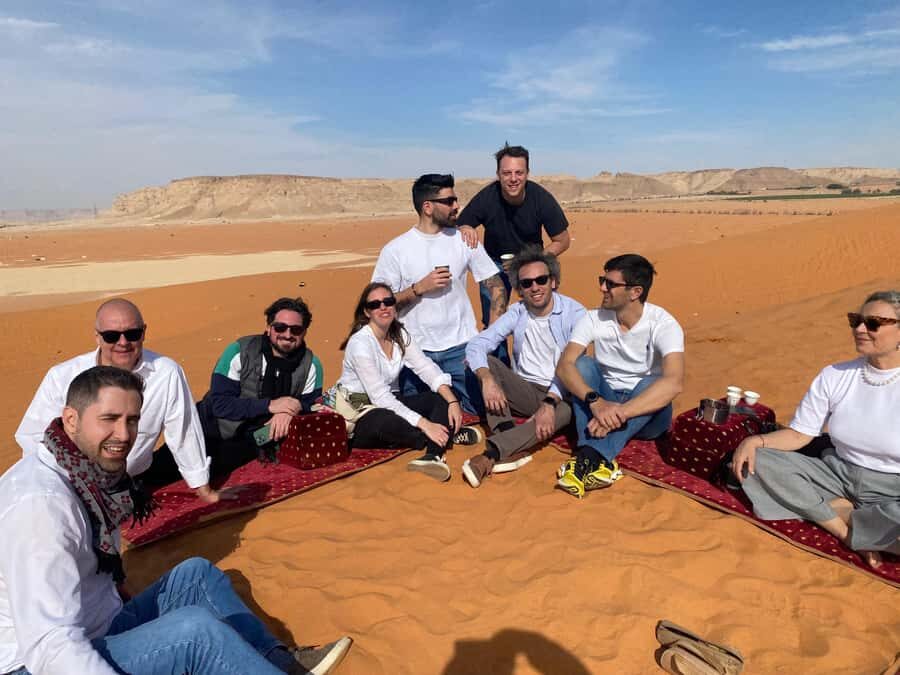 VIP Red Dunes: Camel, Quads, Private Tour & Coffee - Sandboarding and camel rides: the perfect speed switch